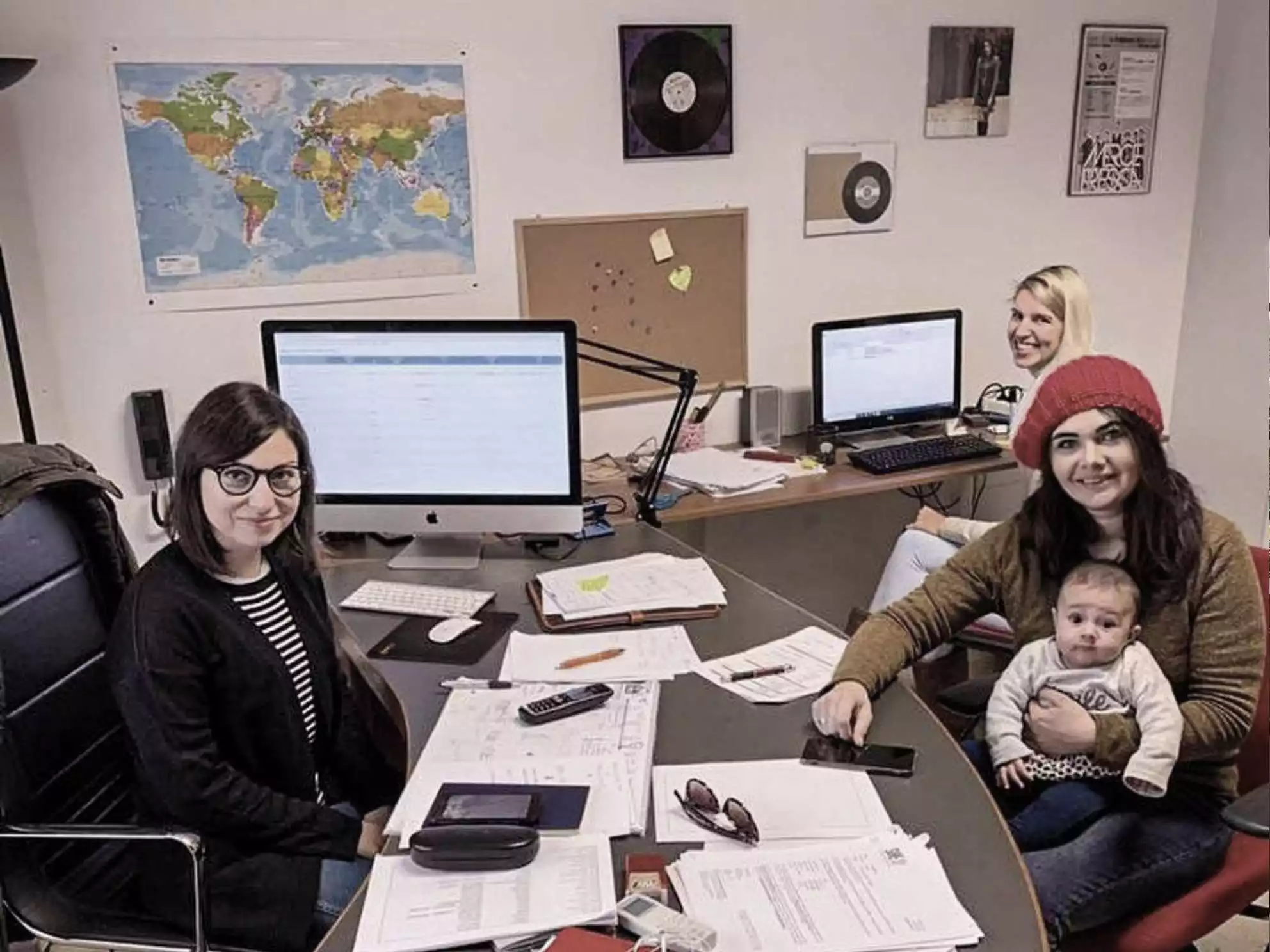 The Mhodì team at work in the office